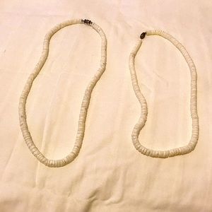 Two shell necklaces for men n women